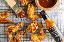 Naked wings brushed with Tamaulipeka Sweet Tamarind & Smoky Chile Hot Sauce