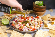 Chechare Hot Sauce poured over Shrimp Ceviche by Josh Deepan